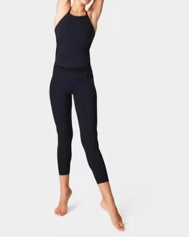 Front of a model wearing a size L Super Soft 7/8 Yoga Leggings in Black in Black by Sweaty Betty. | dia_product_style_image_id:345369